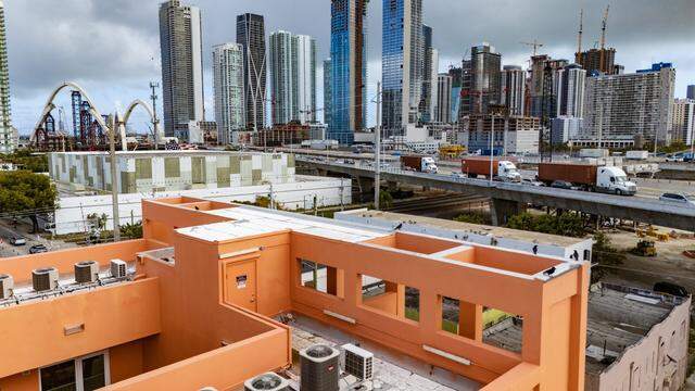 The rooftop view looking south east of Project Peach, an innovative but compact new building in Overtown that combines design flair with three affordable apartments, offices, a retail space on a tiny substandard lot. It's an intense peach/salmon color that recalls a popular peach soda once produced in overtown by a black-owned company. The building, which recently opened, also includes community space where the developer is planning an exhibit of Overtown photos in Miami, Florida, on Tuesday, March 3, 2026. Project Peach building is located at 123 NW 14th Street, in the Overtown area of Miami.