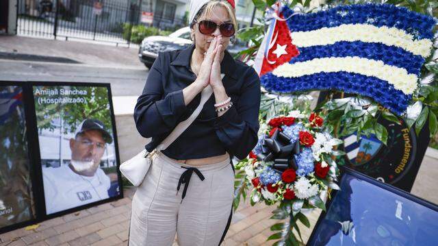 Niurka Prestamo, friends of a detainee reacts during a Proof of Life of Our Brothers ceremony at the Bay of Pigs Monument in the Little Havana area of Miami, Florida, on Sunday, March 8, 2026. Cuban dissident groups held a press conference to demand repatriation of the bodies of the men killed in the shootout with the Cuban Coast Guard on Sunday, March 8, 2026. They also demanded that the U.S. citizens involved in the incident be allowed to speak to U.S. diplomatic employees.