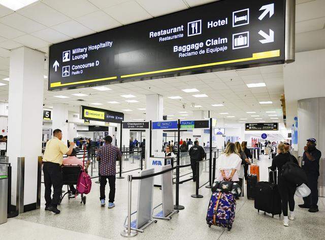 Travelers navigate short TSA lines at Miami International Airport on Monday morning, March 23, 2026. The ongoing partial federal government shutdown has affected many airports around the United States, including Miami and Fort Lauderdale airports.