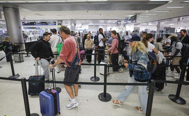 Travelers navigate short TSA lines at Miami International Airport on Monday morning, March 23, 2026. The ongoing partial federal government shutdown has affected many airports around the United States, including Miami and Fort Lauderdale airports.