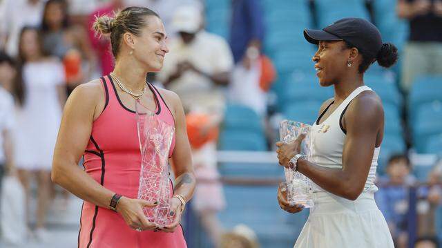 Aryna Sabalenka holds the Butch Buchholz trophy after defeating Coco Gauff during the women's singles title at the Miami Open at Hard Rock Stadium in Miami Gardens, Florida, on Saturday, March 28, 2026.