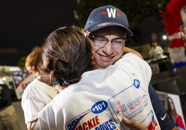 Newly elected Hialeah City Council member Willy Marrero hugs a supporter after winning his race during Interim Mayor Jackie Garcia-Roves' election night watch party at her campaign headquarters on Tuesday, Nov. 4, 2025, in Hialeah, Fla.