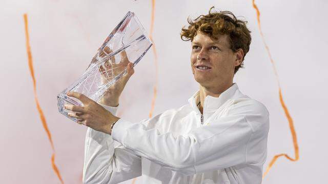 Jannik Sinner of Italy holds the Butch Buchholz trophy after defeating Jiri Lehecka of Czechia in their men's final singles match at the Miami Open tennis tournament on Sunday, March 29, 2026, in Miami Gardens, Fla.