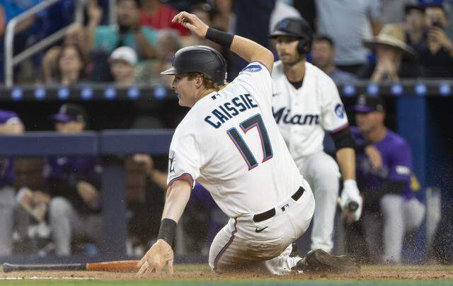 Miami Marlins designated hitter Owen Caissie (17) scores against the Colorado Rockies in the second inning of their MLB game at loanDepot park on Friday, March 27, 2026, in Miami, Fla.