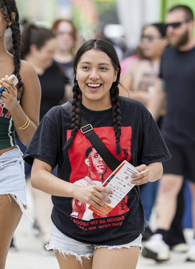 Mery Sanchez reacts as she arrives for the opening day of the 74th annual Miami-Dade County Youth Fair on Thursday, March 12, 2026, in Miami, Fla.