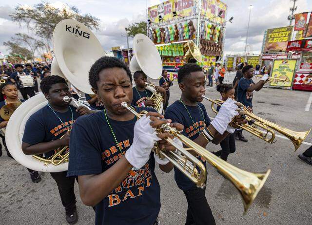 The North Miami Middle School Marching Tigers Band performs during a parade on the opening day of the 74th annual Miami-Dade County Youth Fair on Thursday, March 12, 2026, in Miami, Fla.