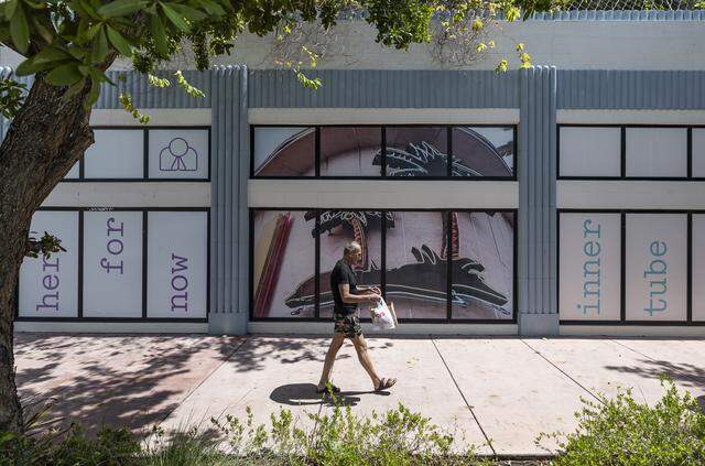 A man makes his way toward the entrance to The Goodtime Hotel off Washington Avenue on Thursday, March 19, 2026, in Miami Beach, Fla.