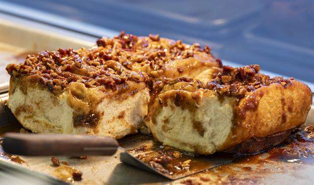 A Buni's Bakery pecan caramel cinnamon roll is ready for guests attending the 74th annual Miami-Dade County Youth Fair on Thursday, March 12, 2026, in Miami, Fla.