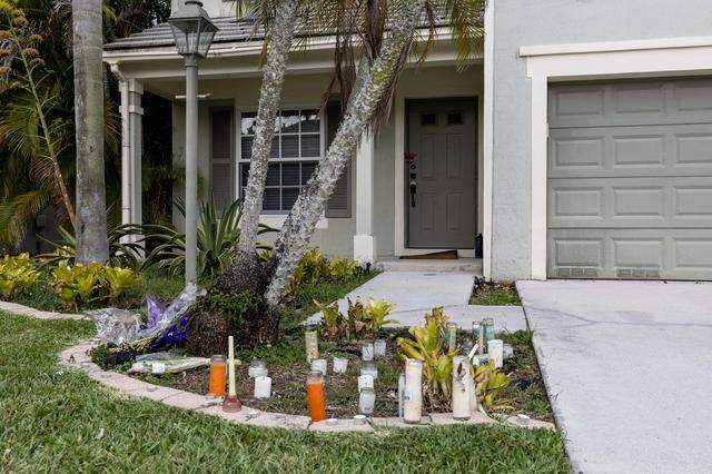 A community memorial stands in front of Mary Gingles’ home on Tuesday, March 4, 2025, in Tamarac, Florida. Nathan Alan Gingles, her estranged husband, is accused of killing Mary, her father and her neighbor around 6:30 a.m. Feb. 16, 2025, in a calculated murder spree across two homes in the Plum Bay community, according to BSO.