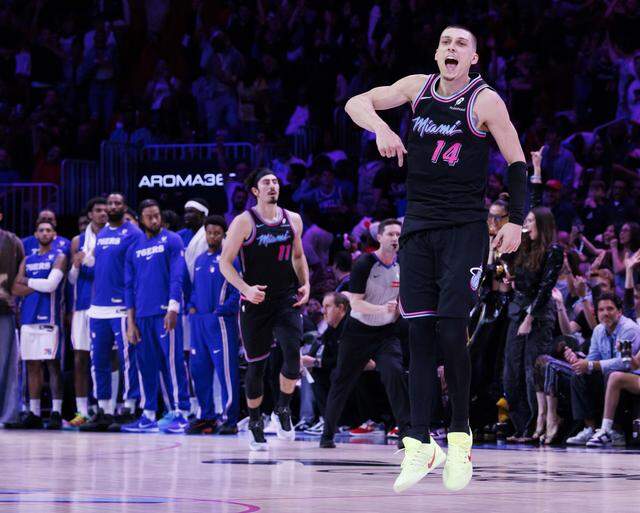 Miami Heat guard Tyler Herro (14) reacts during the second half of a game against the Philadelphia 76ers on Monday, March 30, 2026, at the Kaseya Center in downtown Miami, Fla. 