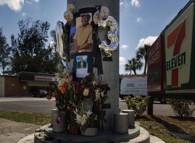 A memorial for Ronald Wilson sits on display on Thursday, March 26, 2026, at the crash site where Wilson, a bystander during a cop chase involving BSO deputies, was killed at the corner of Prospect Rd. and NW 31st Ave in Fort Lauderdale, Fla.