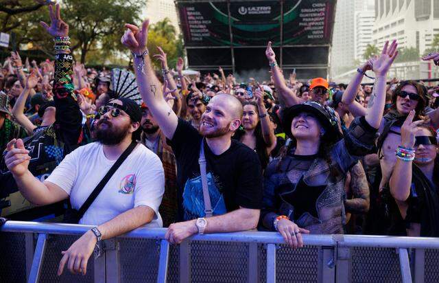 Attendees dance at the Worldwide Stage during the third day of Ultra Music Festival on Sunday, March 30, 2025, at Bayfront Park in downtown Miami, Fla. 