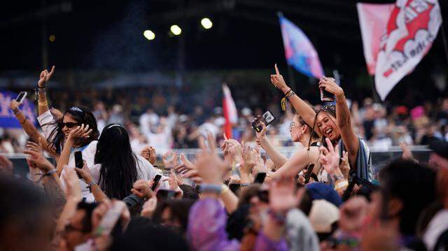 Fans dance during the third day of Ultra Music Festival on March 30, 2025, at Bayfront Park in downtown Miami.