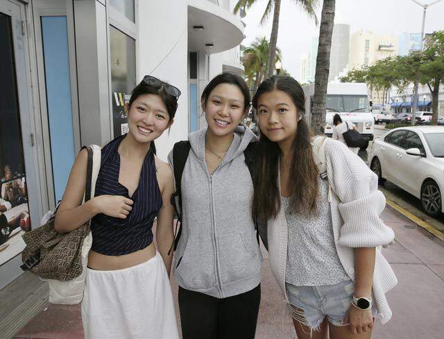 Emory University, GA students (from the left) Hazel Park, Haylie Li and Nicole Zhou pose for the picture while on spring break in Florida on Friday, March 13, 2026 in Miami Beach . Andrew Uloza / for Miami Herald