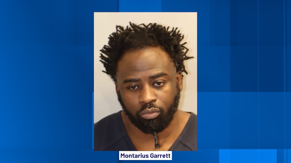 Garrett was arrested and charged with human trafficking, according to arrest papers.