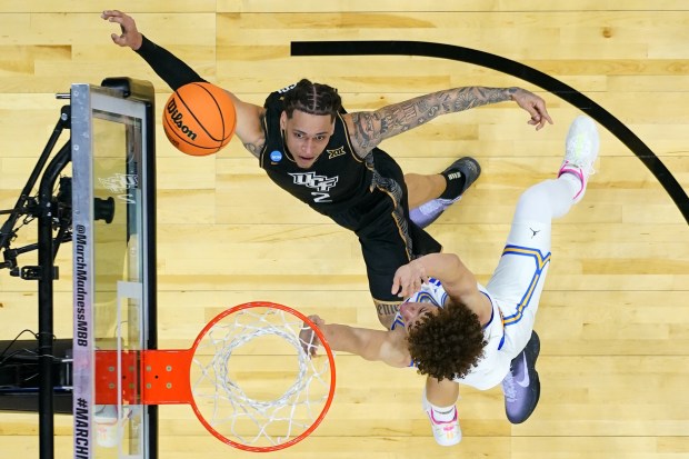 UCF guard Riley Kugel goes up for a shot during the first half against UCLA in the first round game in the NCAA Tournament at Xfinity Mobile Arena in Philadelphia. (AP Photo/Matt Slocum)