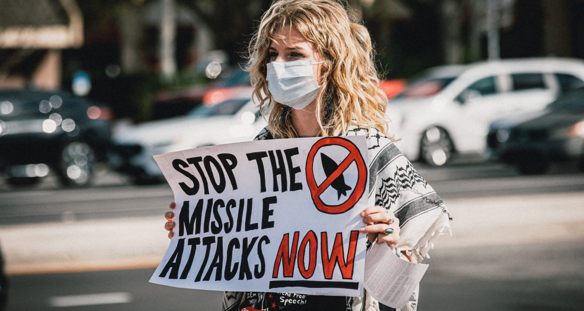Photos: Tampa protesters rally against Iran war and Cuban embargo