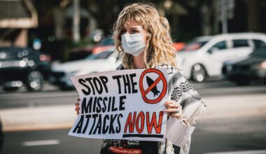 Photos: Tampa protesters rally against Iran war and Cuban embargo