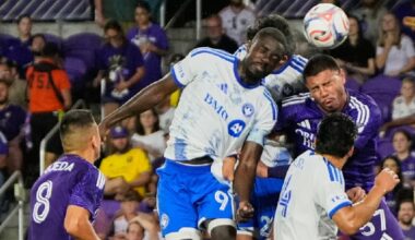 CF Montreal forward Prince Owusu (9) heads the ball to score a goal off a corner kick against Orlando City defender Iago during the first half of an MLS soccer match, Saturday, March 14, 2026, in Orlando, Fla. (AP Photo/John Raoux)