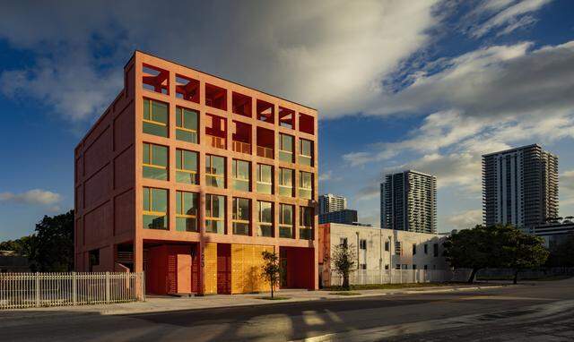 The new Project Peach building in Miami’s Overtown neighborhood takes its name and color from a one-time neighborhood staple, peach-flavored Cola-Nip soda. The compact building includes a forthcoming juice bar, office and community event spaces, and three affordable live-work apartments.