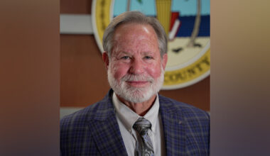 School Board Member, Armor Persons, recognized for earning honorable distinction