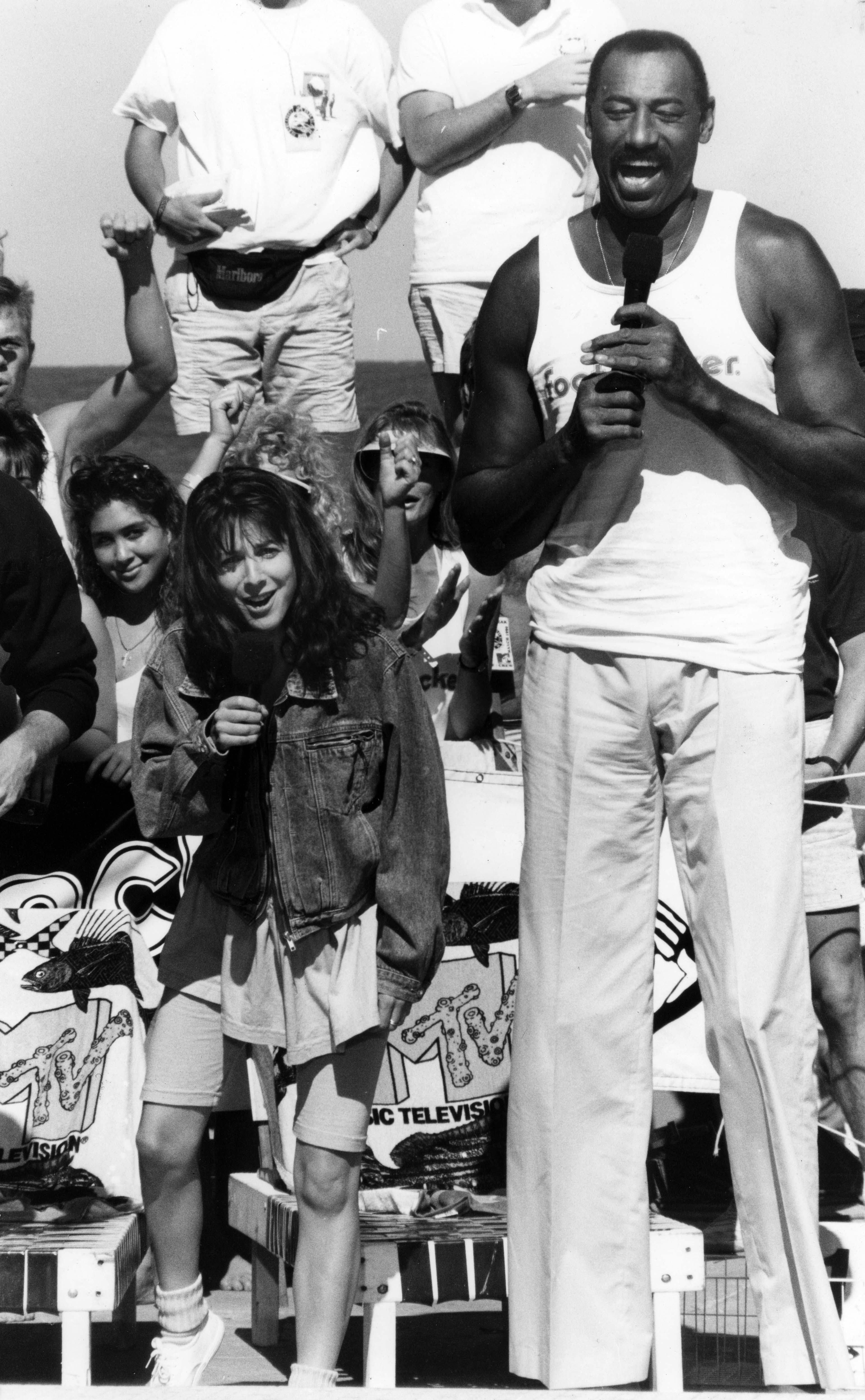 MTV host Martha Quinn is dwarfed by NBA great Wilt...