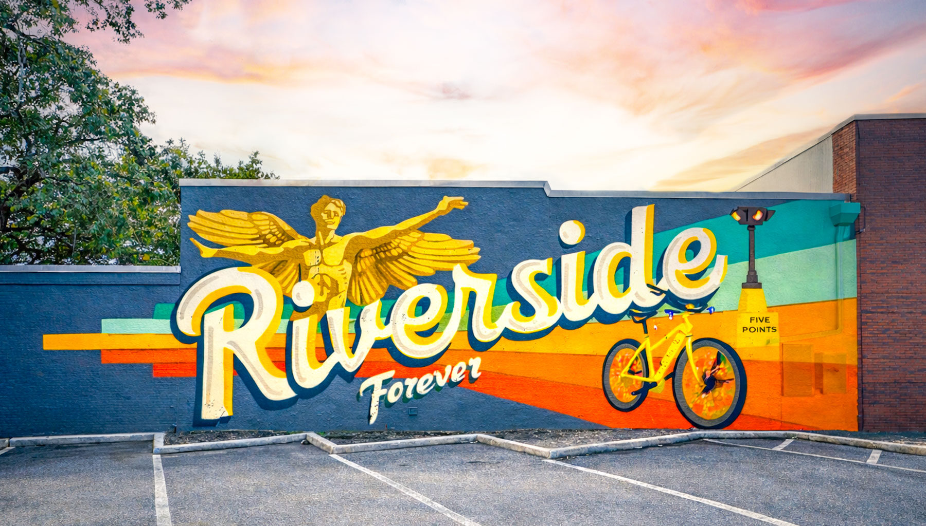 John and Tiffany Kovacs, owners of the new F45 Training, have commissioned a “Riverside Forever” mural for the side of their building.