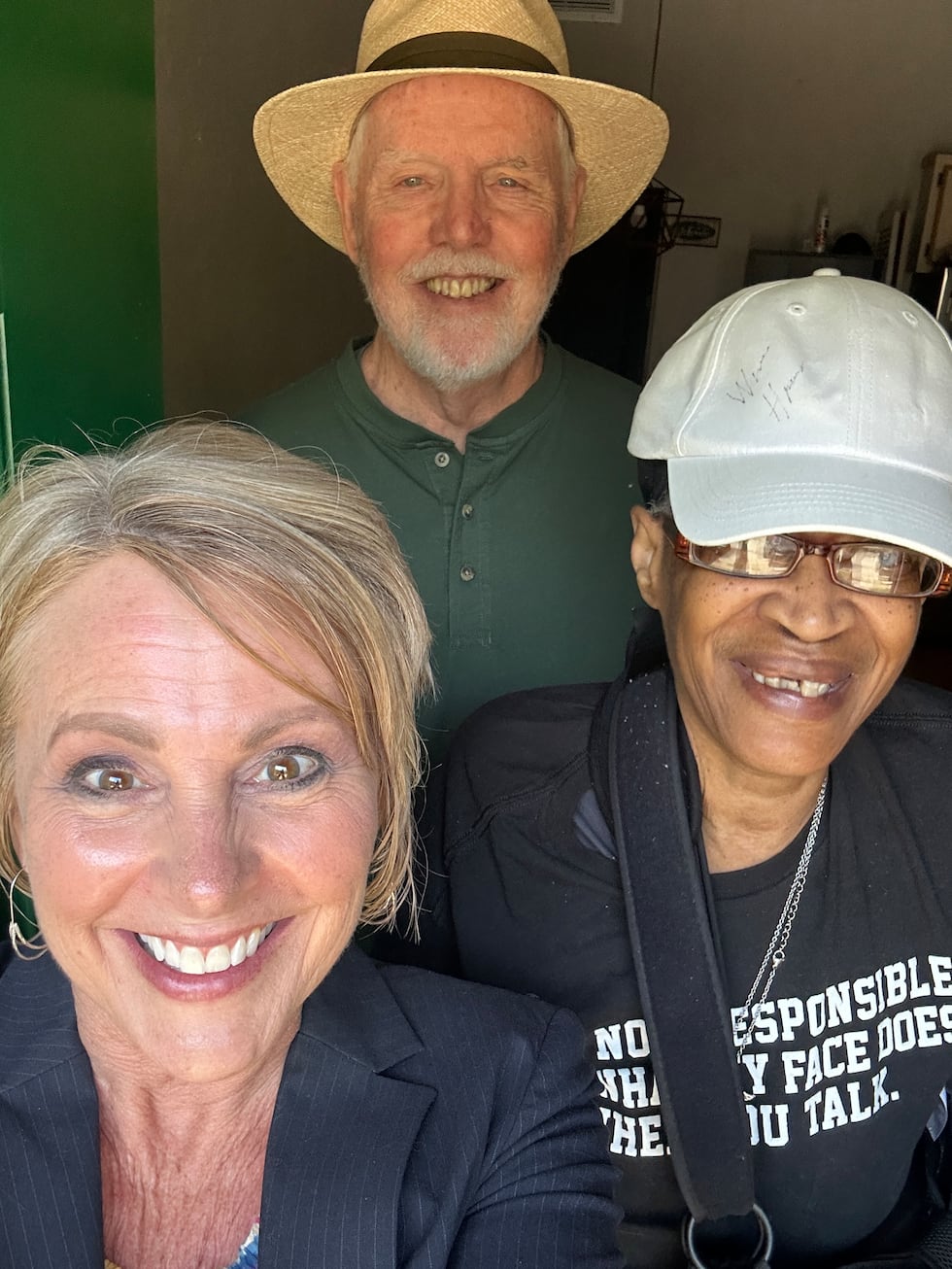 WCTV's Julie Montanaro with volunteer Tom Kirwin and senior Ms. Hunter