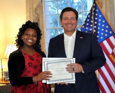 Saije Wade Cody with Governor Ron Desantis