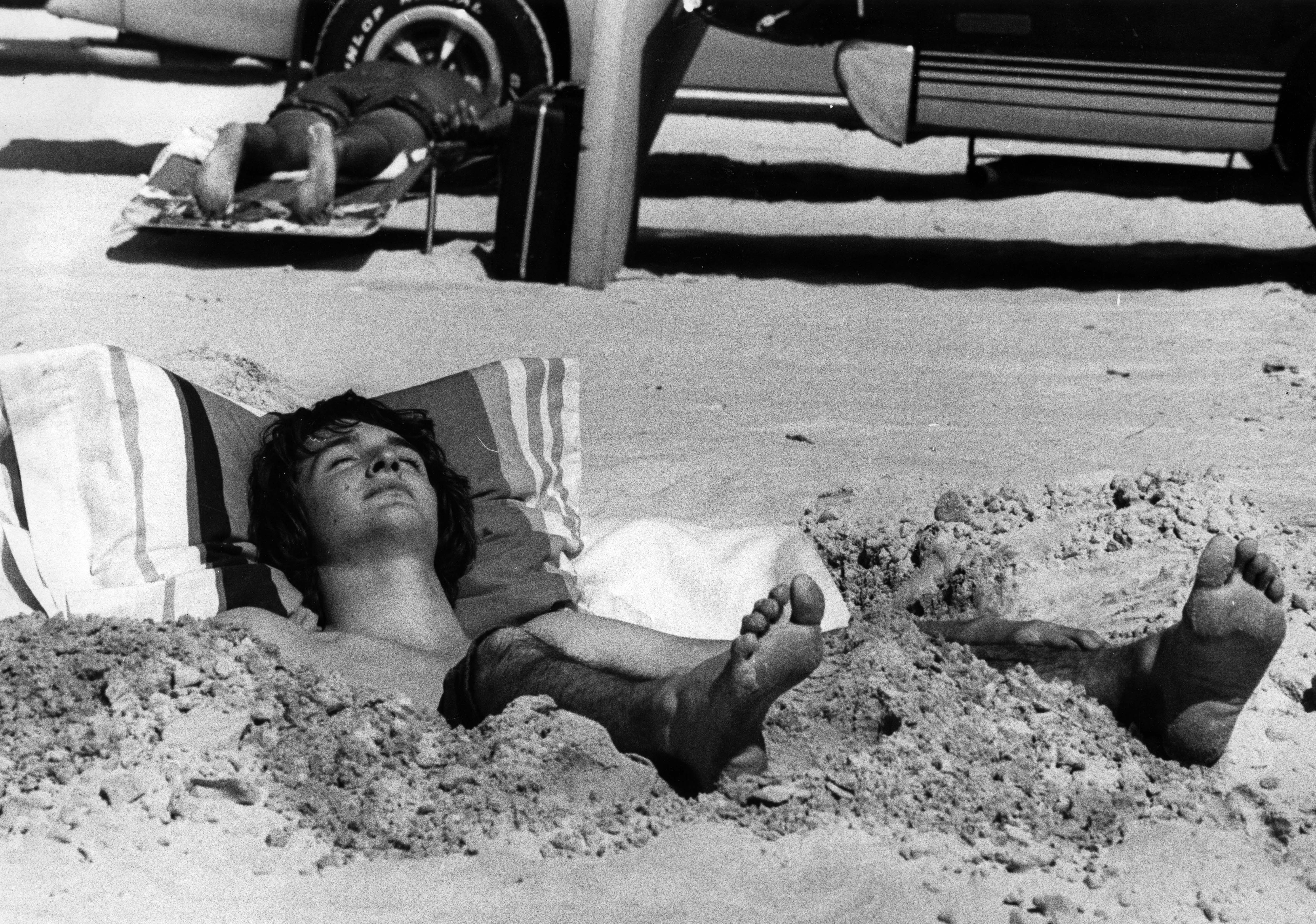 Jeff Herbig of Cincinatti, Ohio digs out a chaise lounger...