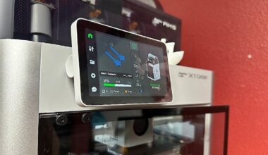 A 3D printer works to create a keychain at the TASCO Center for Teen Technology (Angie Angers).