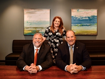 From left, Todd Perkins, Sarah Blackley and Chris Thompson of Upper Deck Wealth Management. Photo courtesy Upper Deck Wealth Management