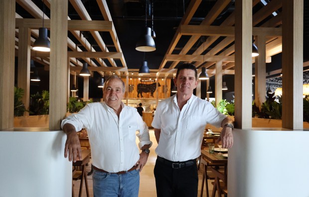 Owner Carlos Ruiz, left, and manager Pedro Rivero at The Knife Parrilla Argentina in Coral Springs on Friday, Feb. 27, 2026. (Carline Jean/South Florida Sun Sentinel)