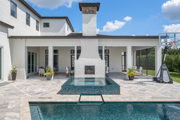 The two-year renovation included a facelift for the outdoor area, with a new cabana and outdoor kitchen near the pool. (Photo by VTR Image)