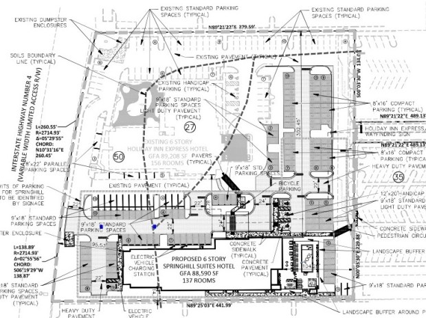 Orlando-based Universal Hotels Group LLC is seeking to build a seven-story, 137-key SpringHill Suites by Marriott on vacant land adjacent to an existing 156-key Holiday Inn Express it owns at 7276 International Dr. (Site plan by Florida Engineering Group)