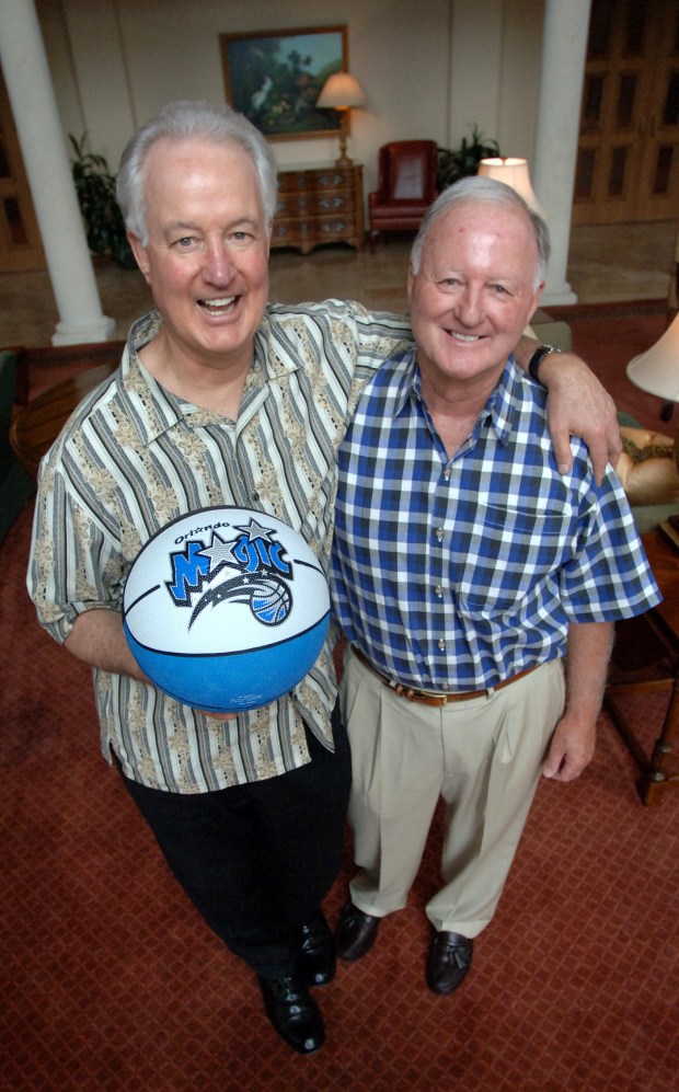 Pat Williams and Jimmy Hewitt reminisce about 20 years of the Orlando magic franchise that they helped bring to Orlando during a meeting at Country Club of Orlando on June 15, 2006. (Joe Burbank/Sentinel archive)