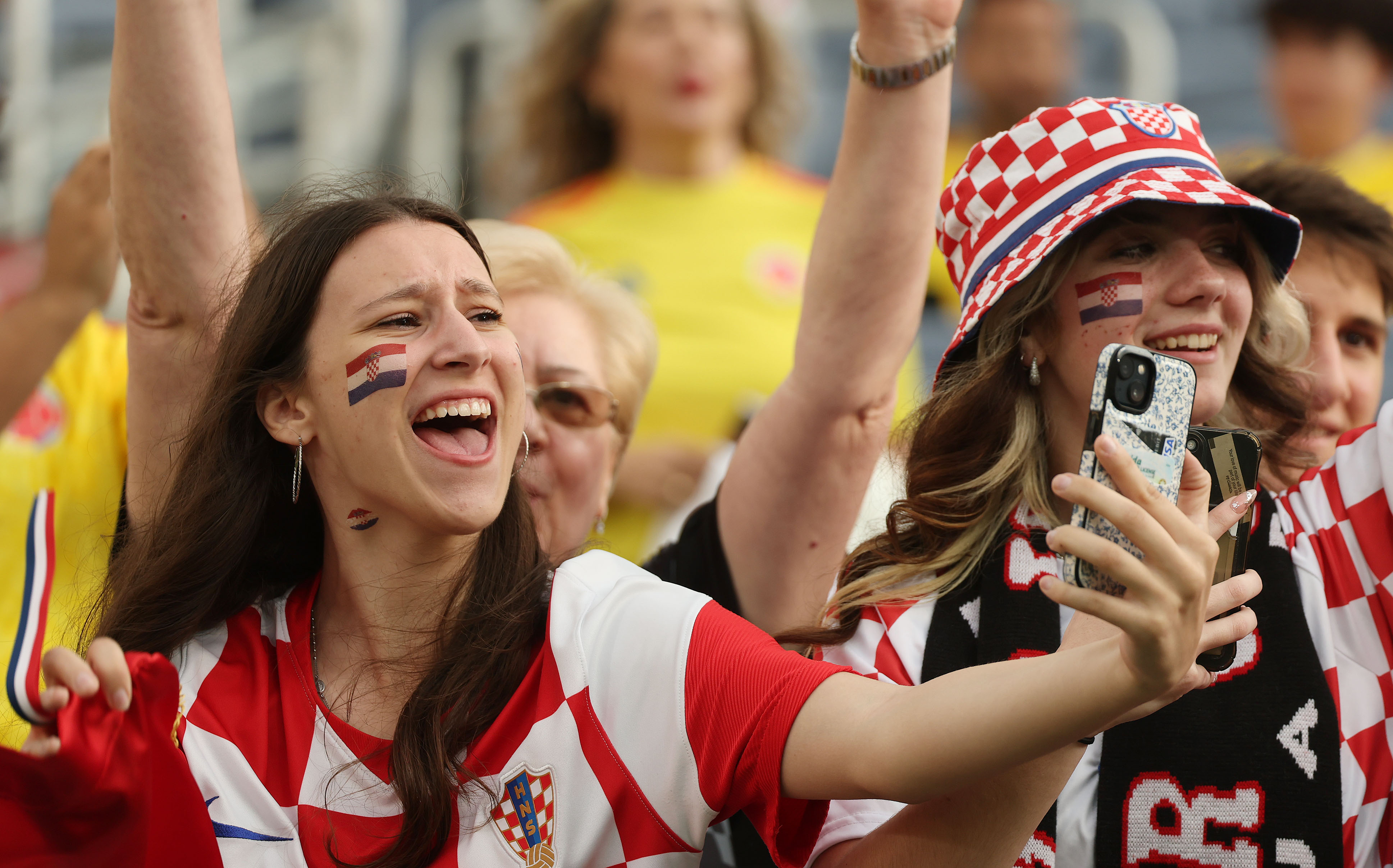 Fans cheer during the Road to 26 FIFA Match of...