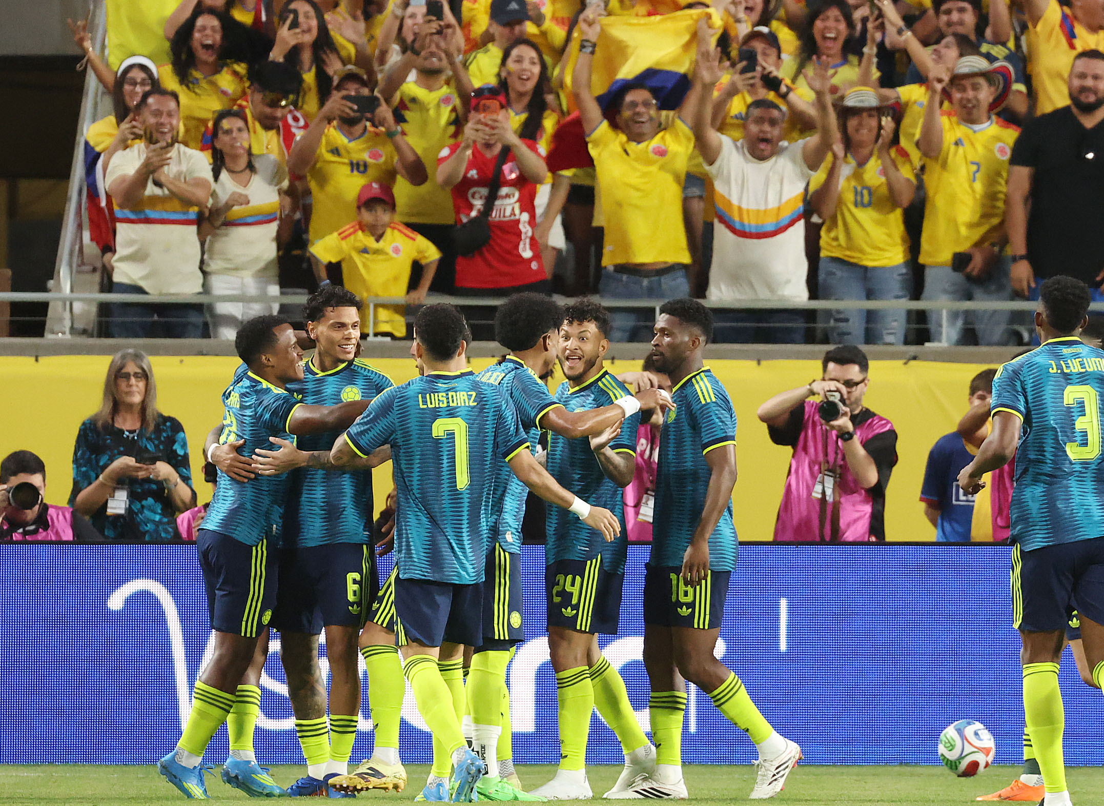 Colombia players celebrate after a goal during the Road to...