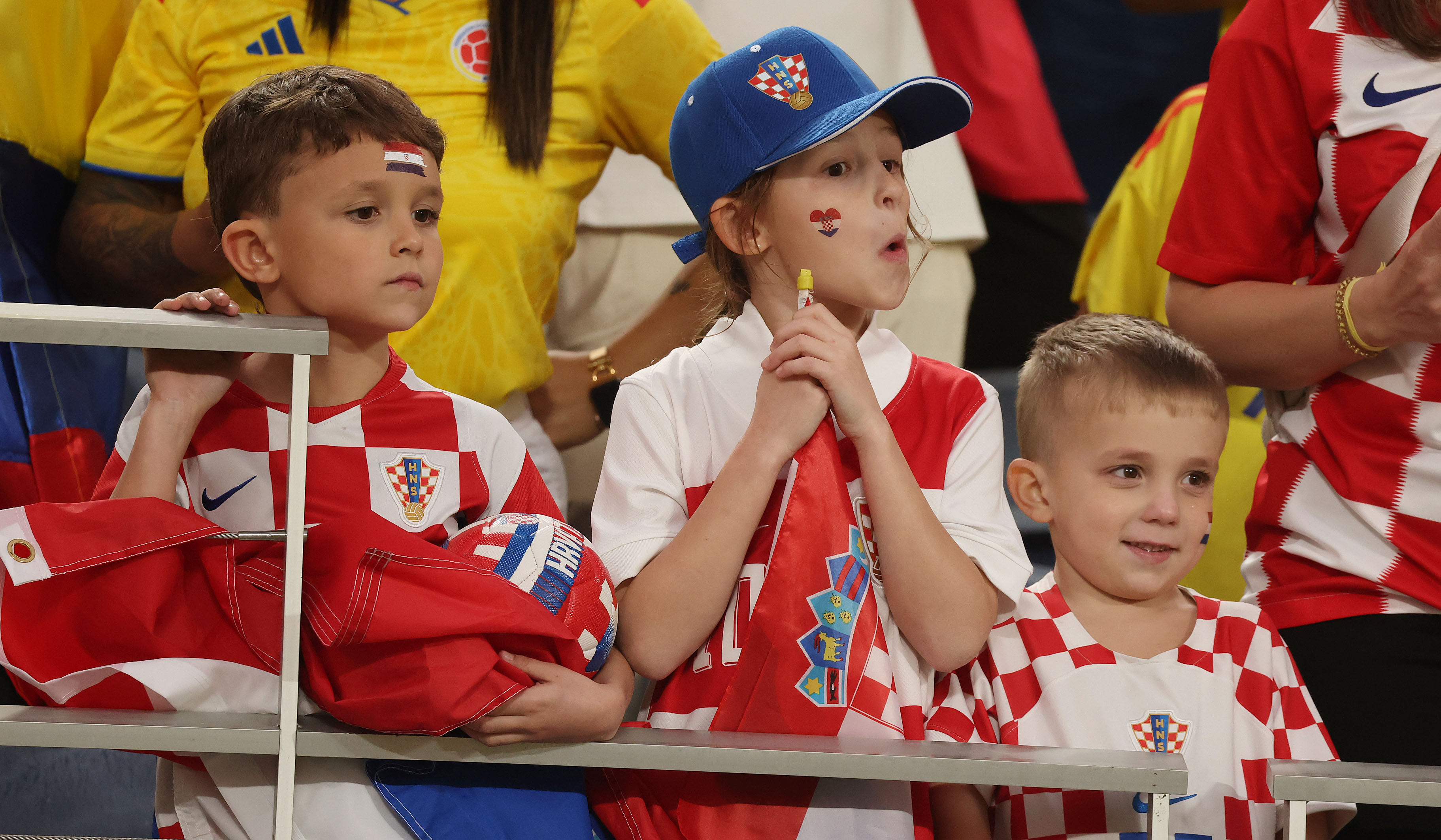 Young Croatia fans enjoy themselves during the Road to 26...