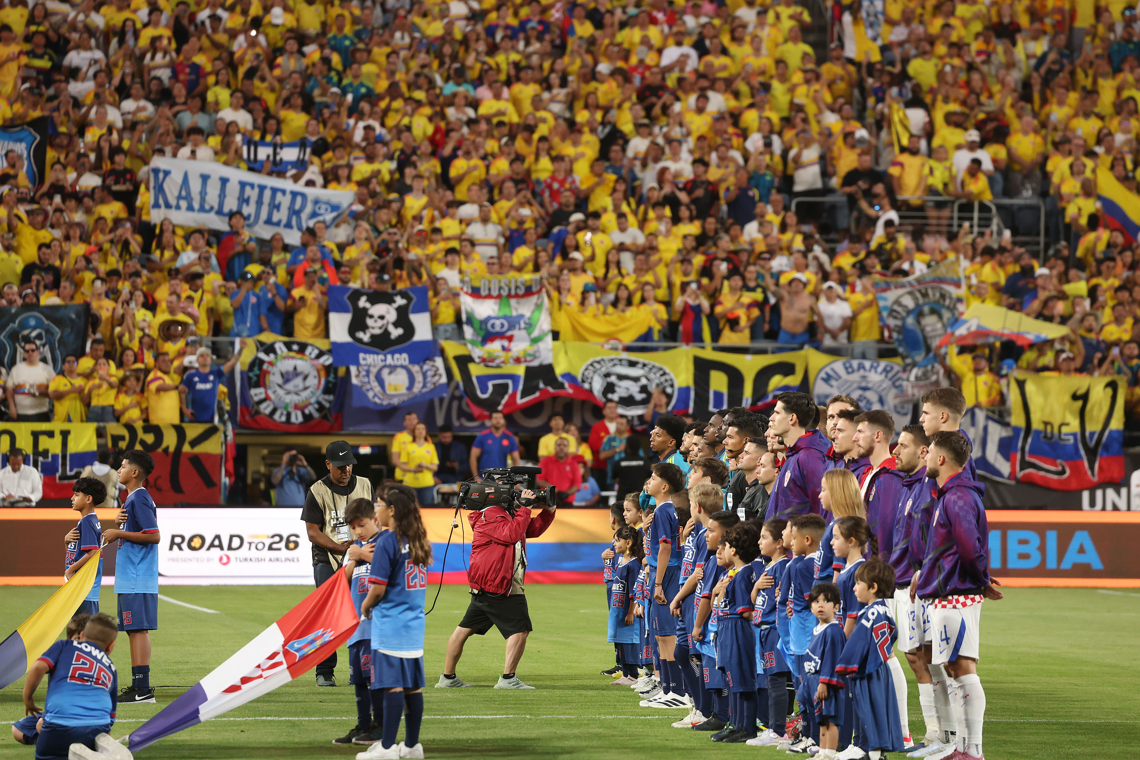 Players line up before the Road to 26 FIFA Match...