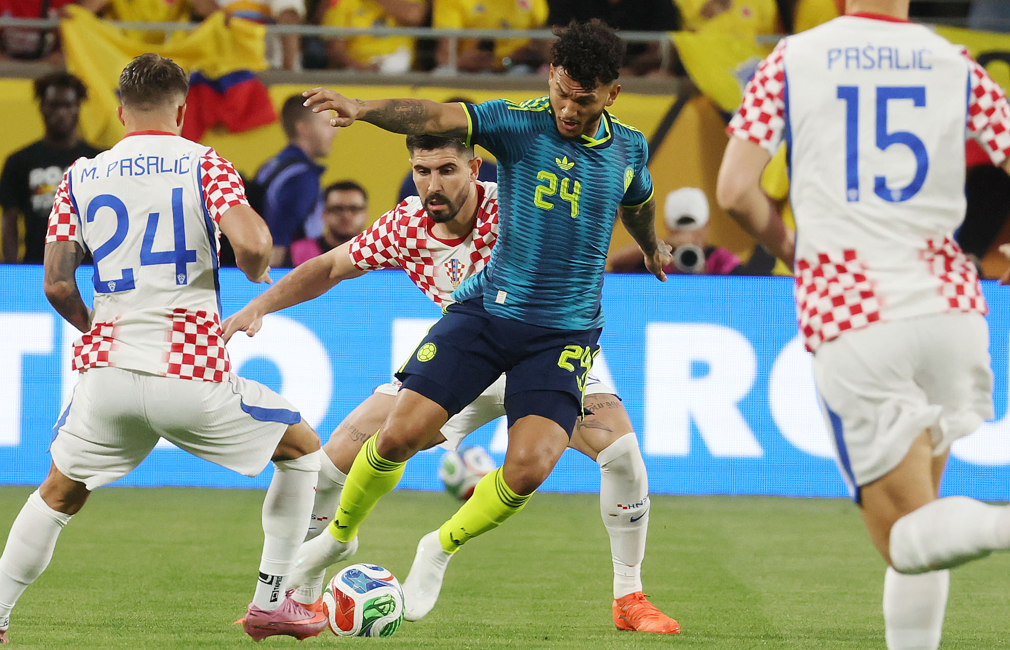 Colombia player Luis Suarez (24 middle) moves the ball during...