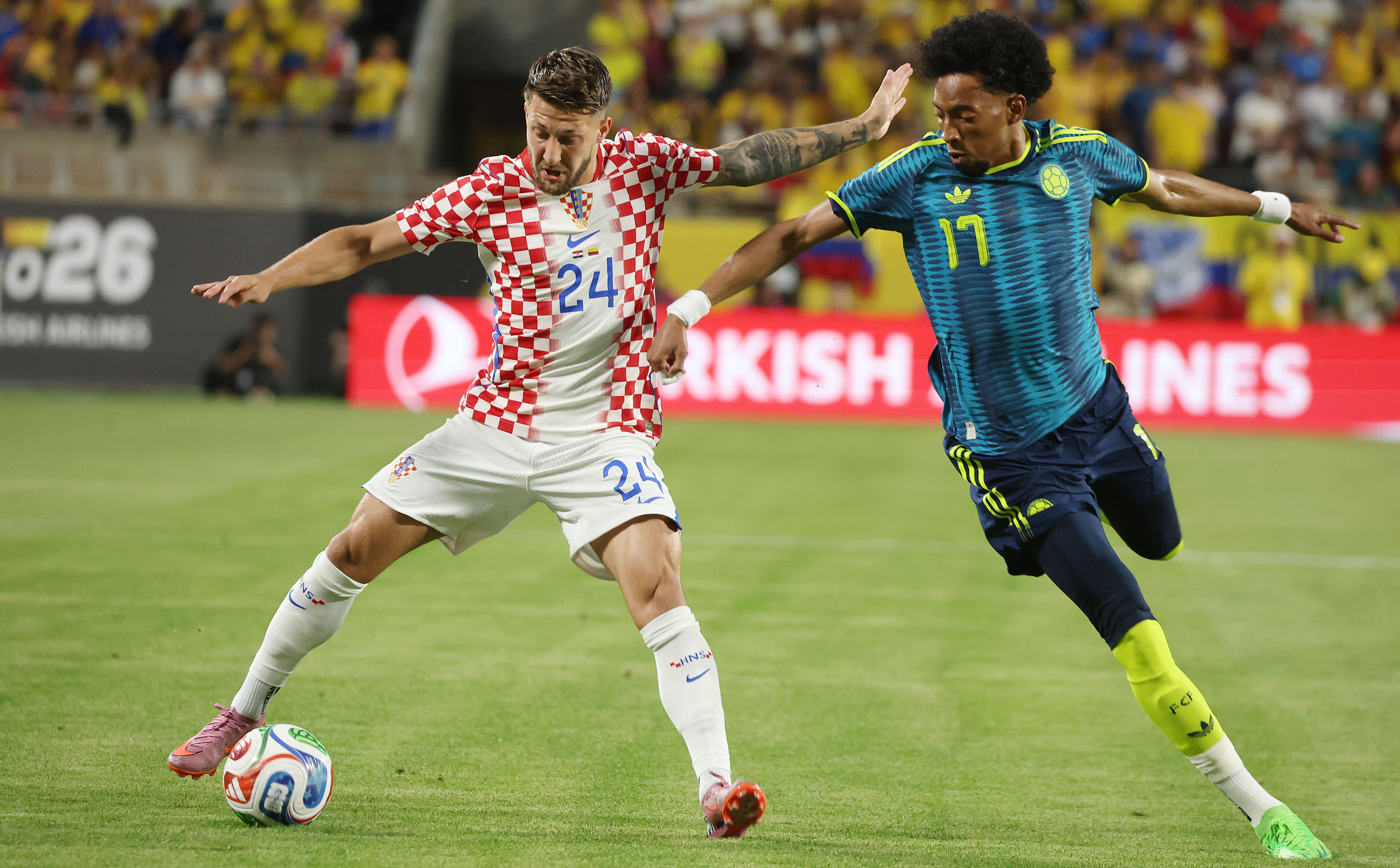 Croatia player Marco Pasalic (24) controls the ball beside Columbia...