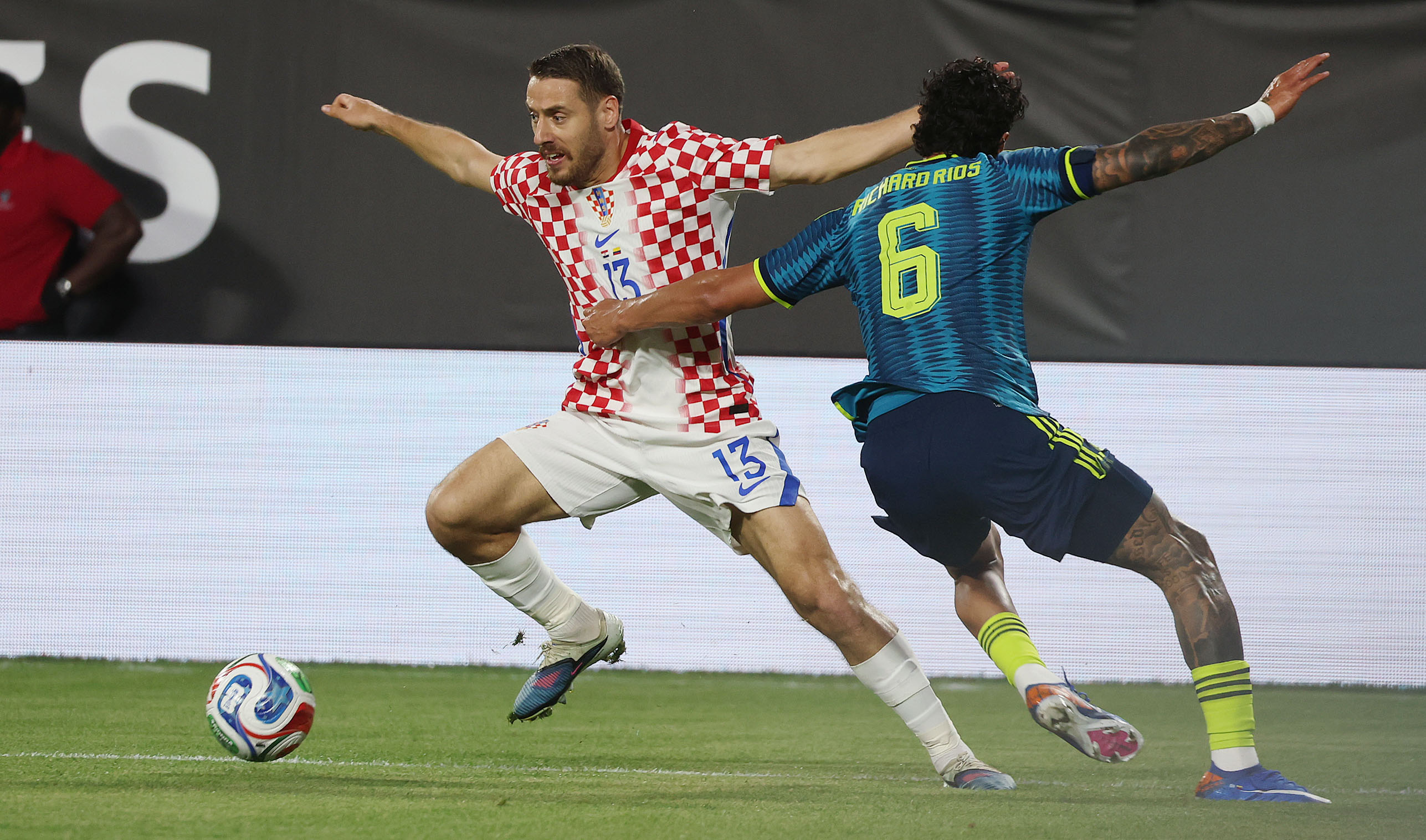 Colombia player Richard Rios (6) grabs Croatia player Nikola Vlasic...