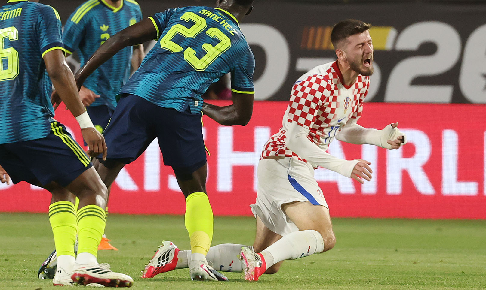 Croatia player Petar Sucic falls during the Road to 26...