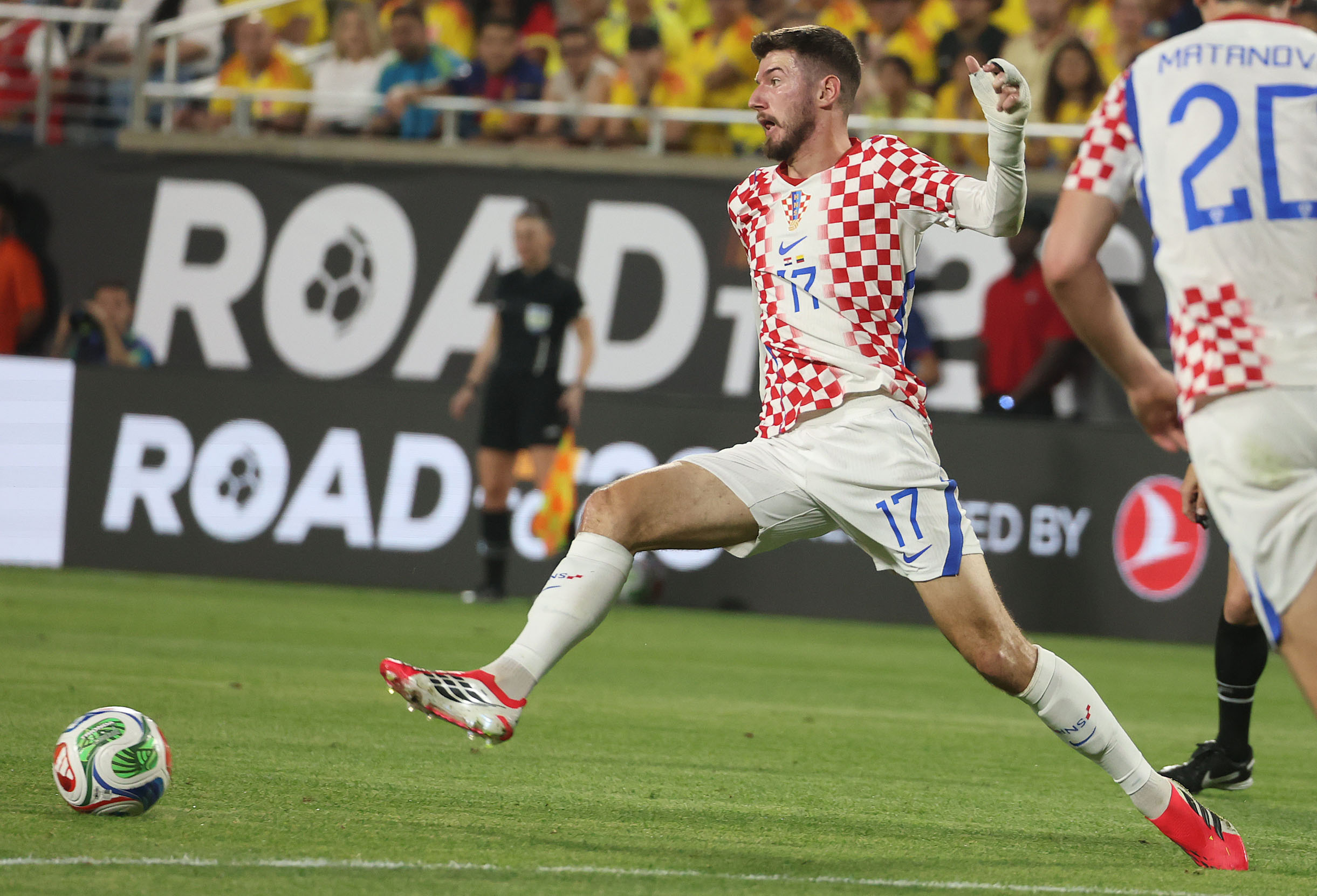 Croatia player Petar Sucic kicks during the Road to 26...