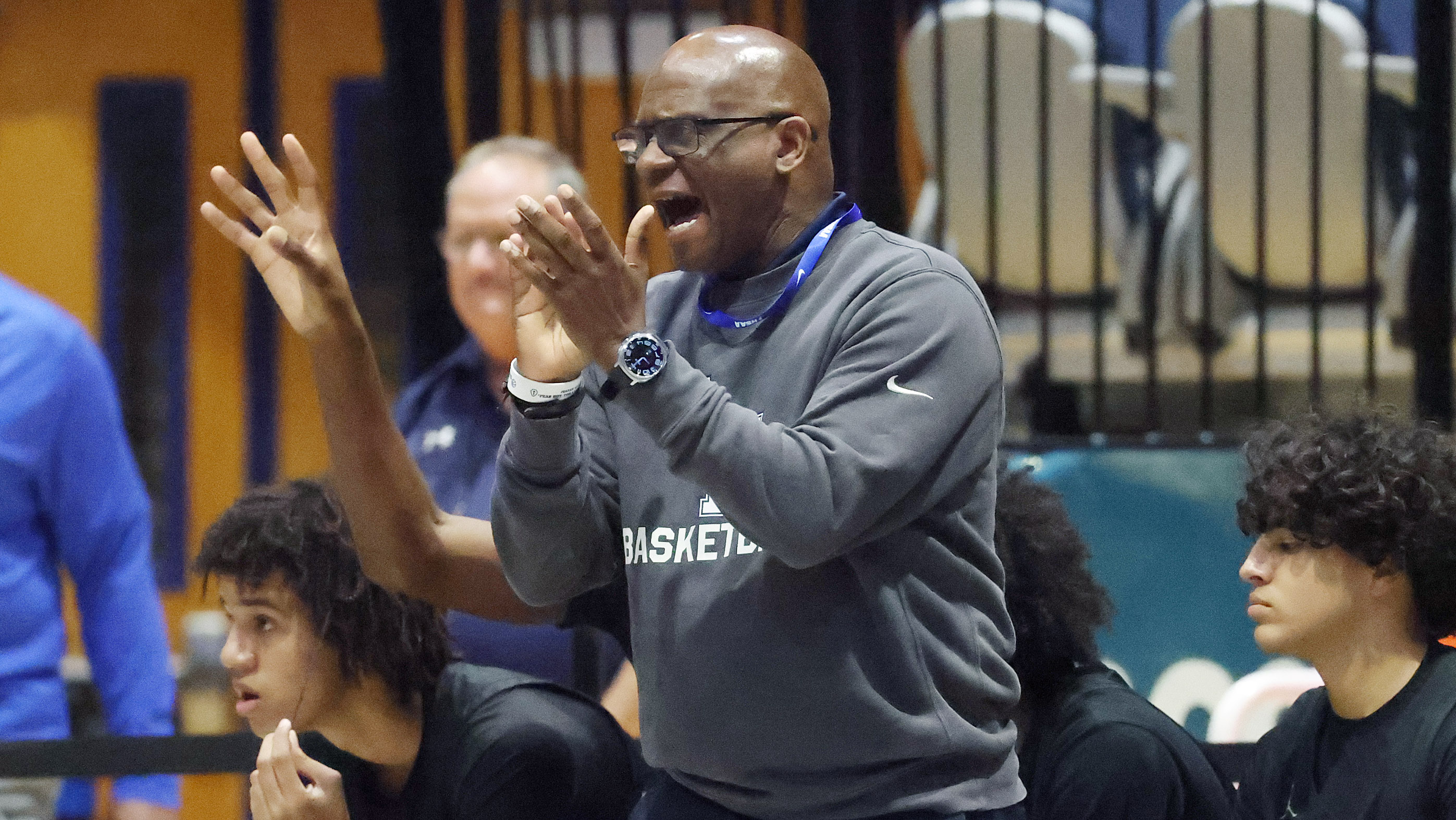 Lake Howell coach Mike Sutton yells during the Lake Howell...