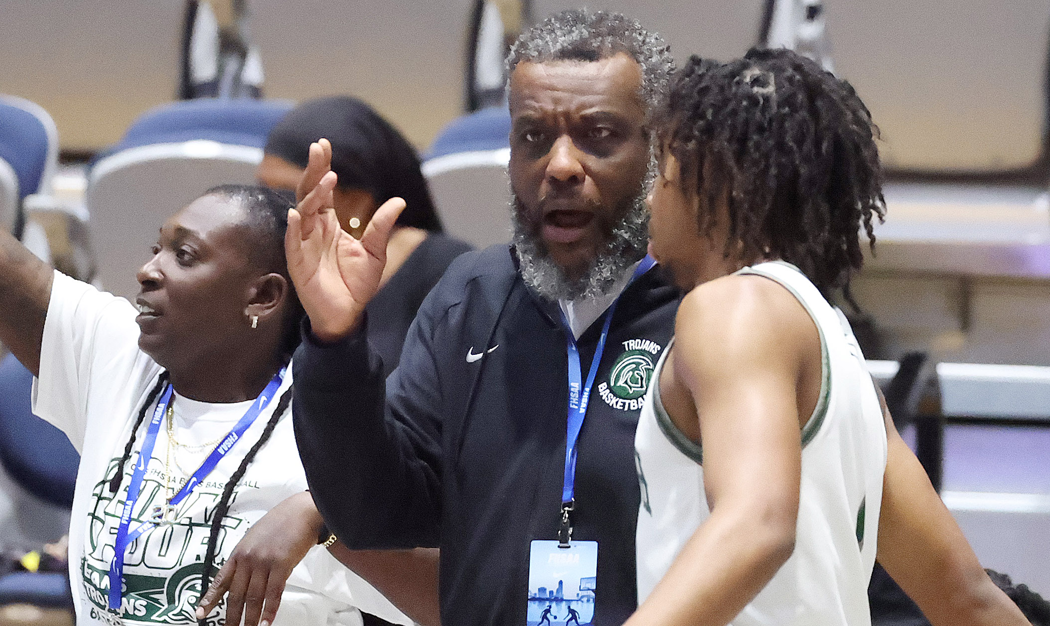 Evans coach Lonza Morgan (middle) coaches during the Lake Howell...