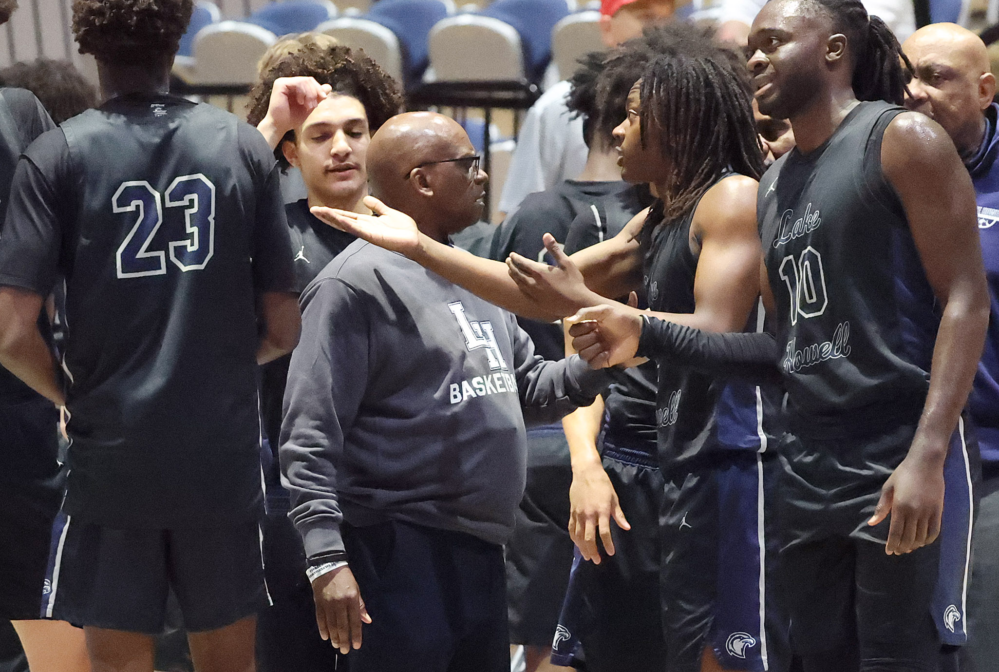 Lake Howell coach Mike Sutton coaches players during the Lake...