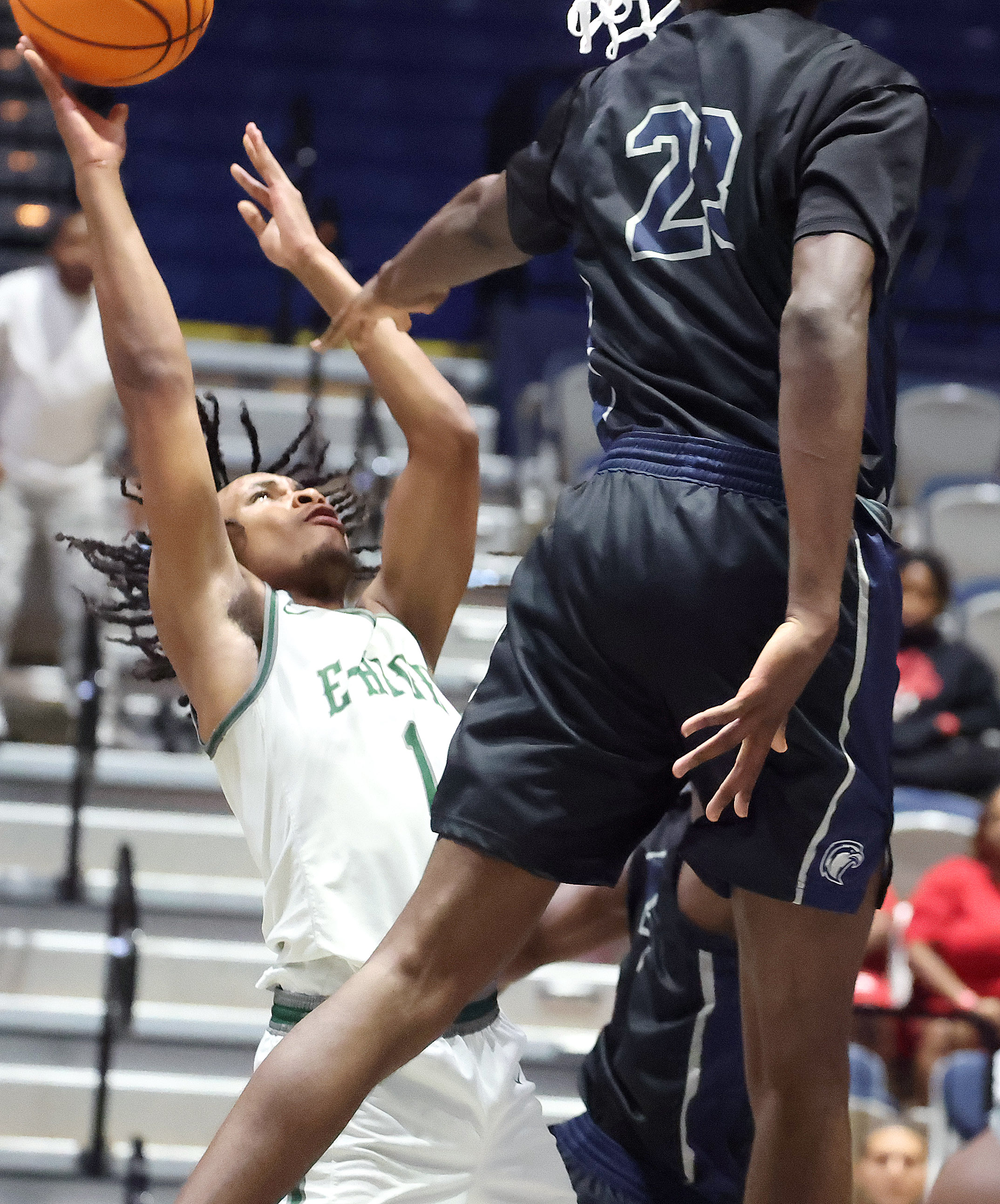 Evans player Jakai Hardy (1) shoots under Lake Howell player...