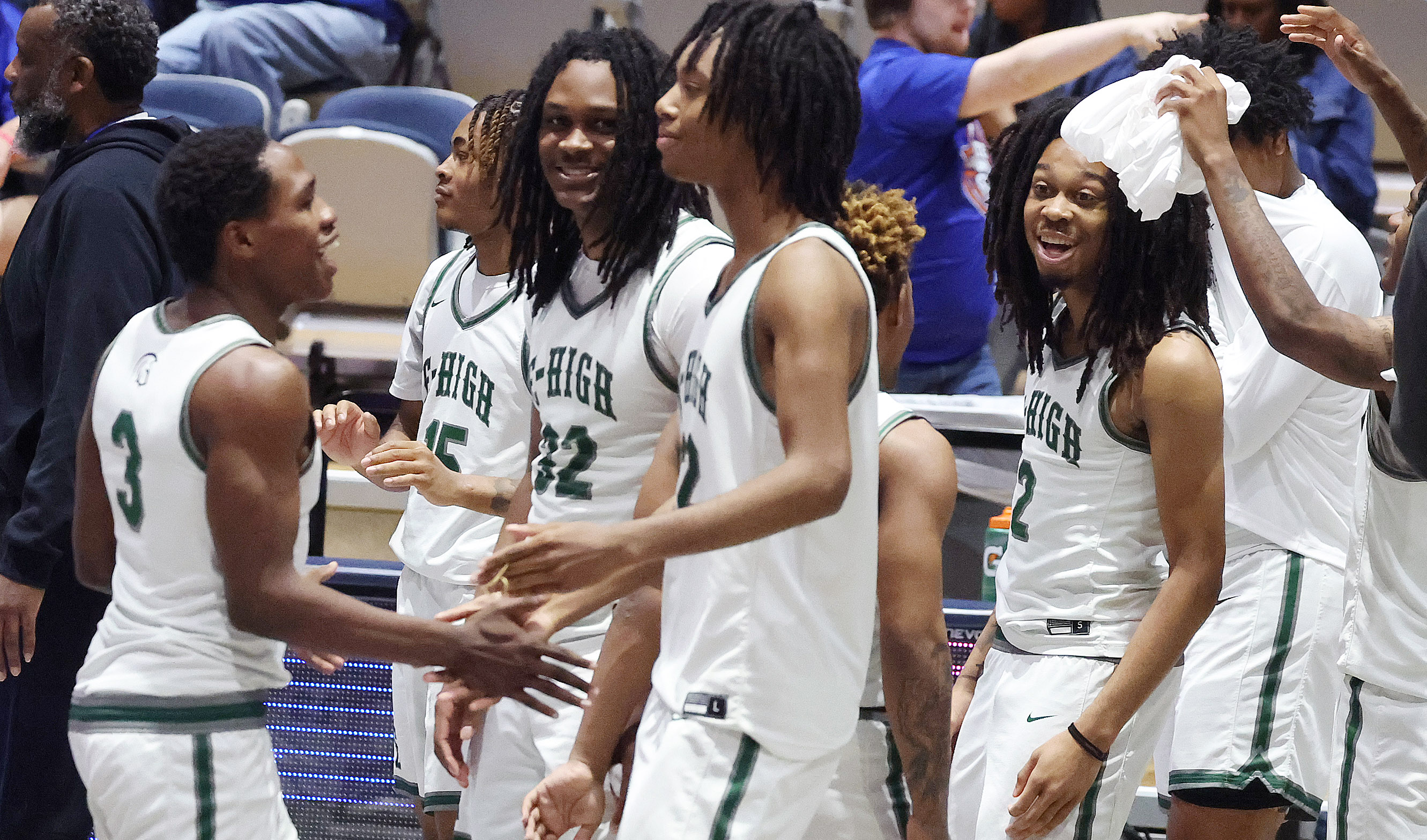 Evans players celebrate after winning the Lake Howell versus Evans...